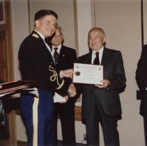 Col. Kevin M. Rice presents an honorary degree to Shigeya Kihara, 2 Nov. 2001.